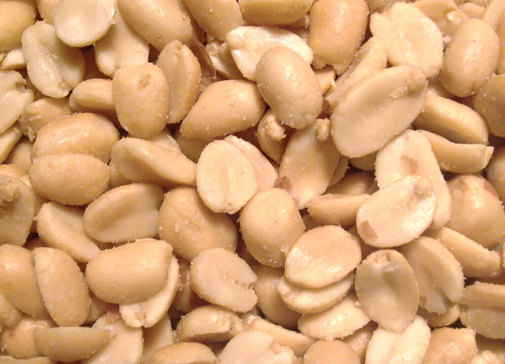 Close up of a number of peanuts slightly salted