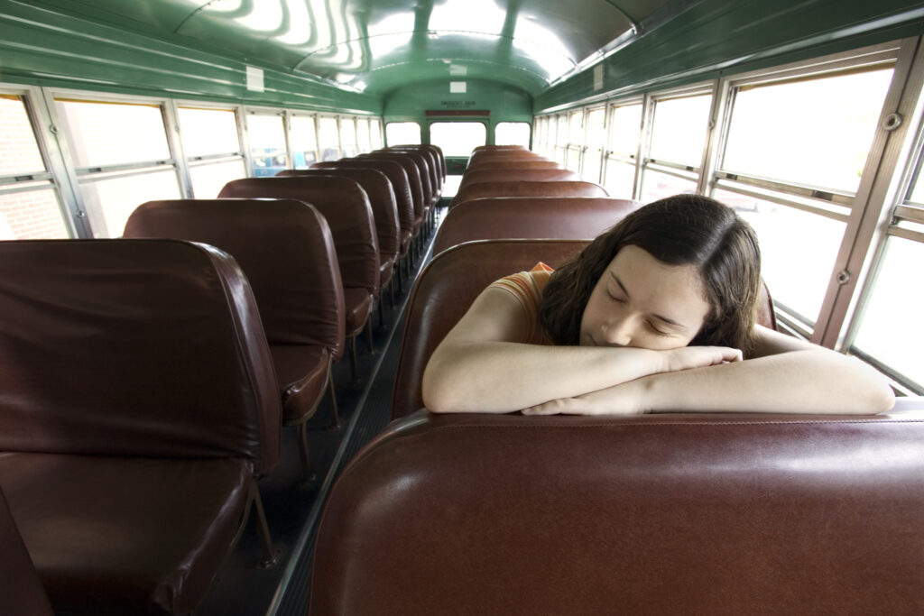 Tired girl on a bus